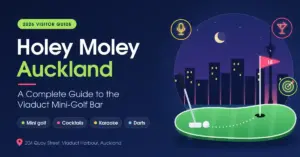Illustrated featured graphic for a Holey Moley Auckland guide, showing a mini-golf green with a putter, ball and flag in front of a night-time Viaduct Harbour skyline, with icons for karaoke, cocktails and darts.